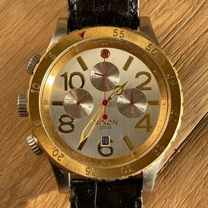 Nixon 48-20 leather band chronograph analog watch